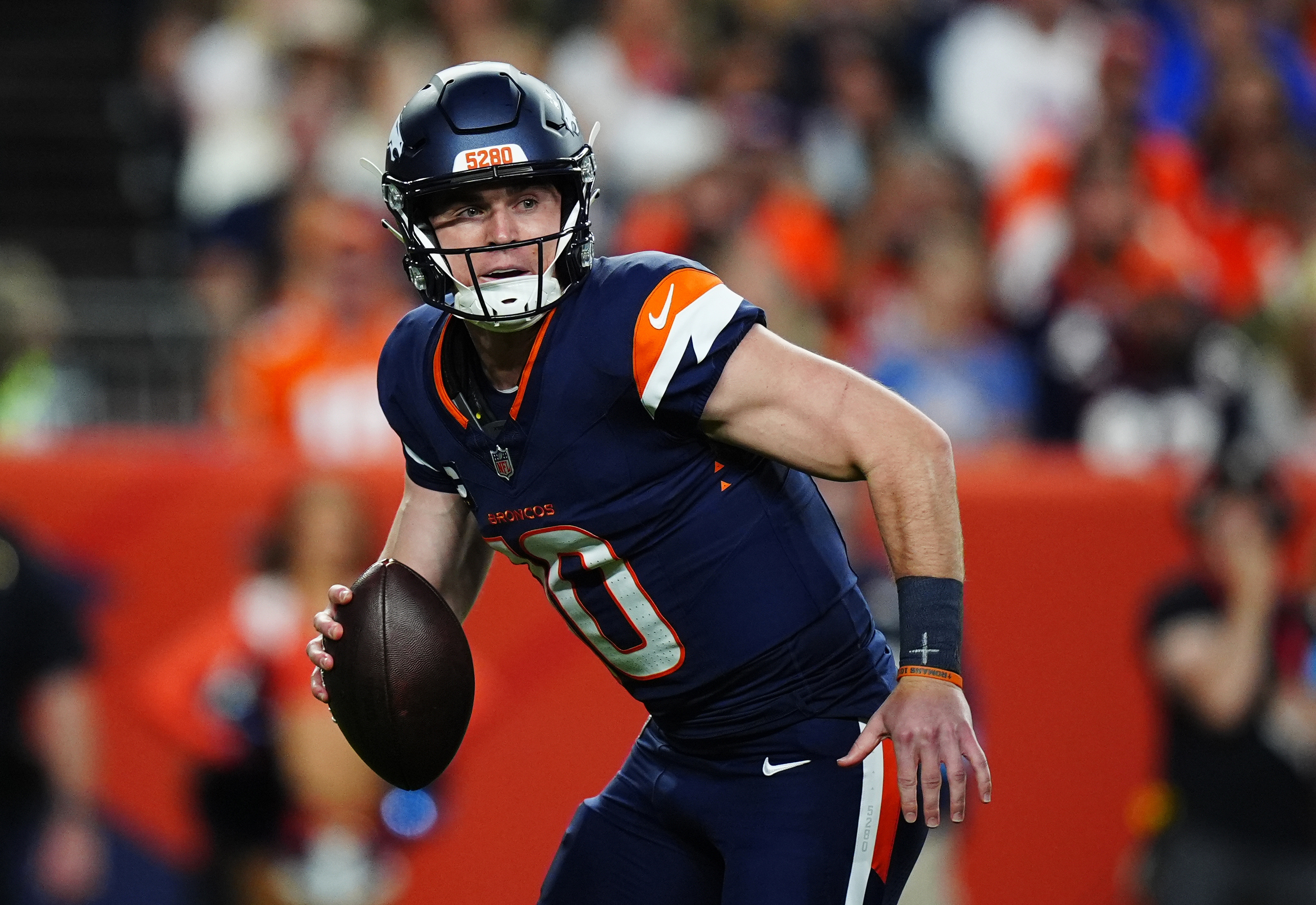 Broncos quarterback Bo Nix (10) looks to pass as we break down our Broncos vs. 49ers prediction.