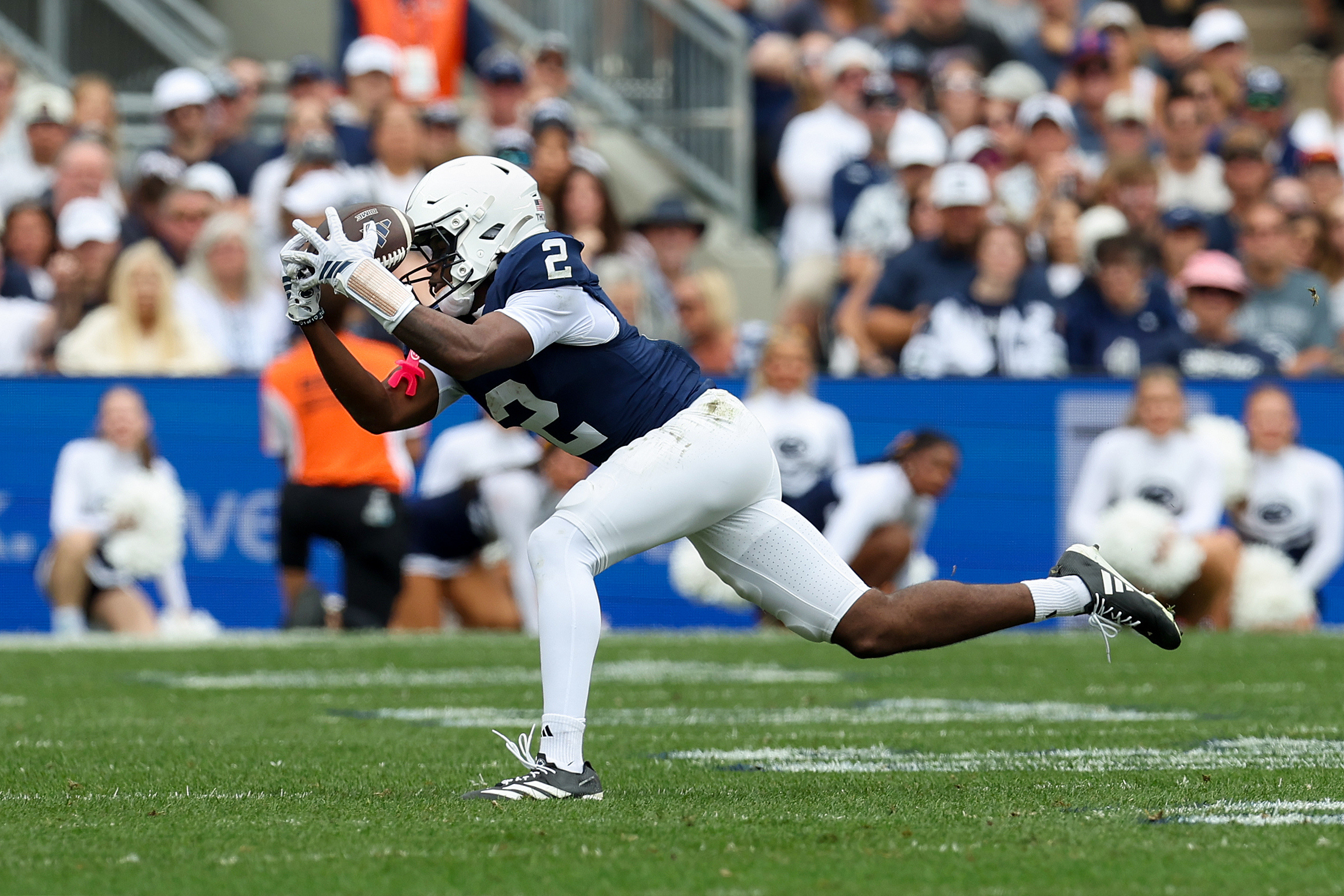 Penn State Nittany Lions wide receiver Zay Robinson makes a catch as we make our best Wisconsin vs. Penn State prediction.