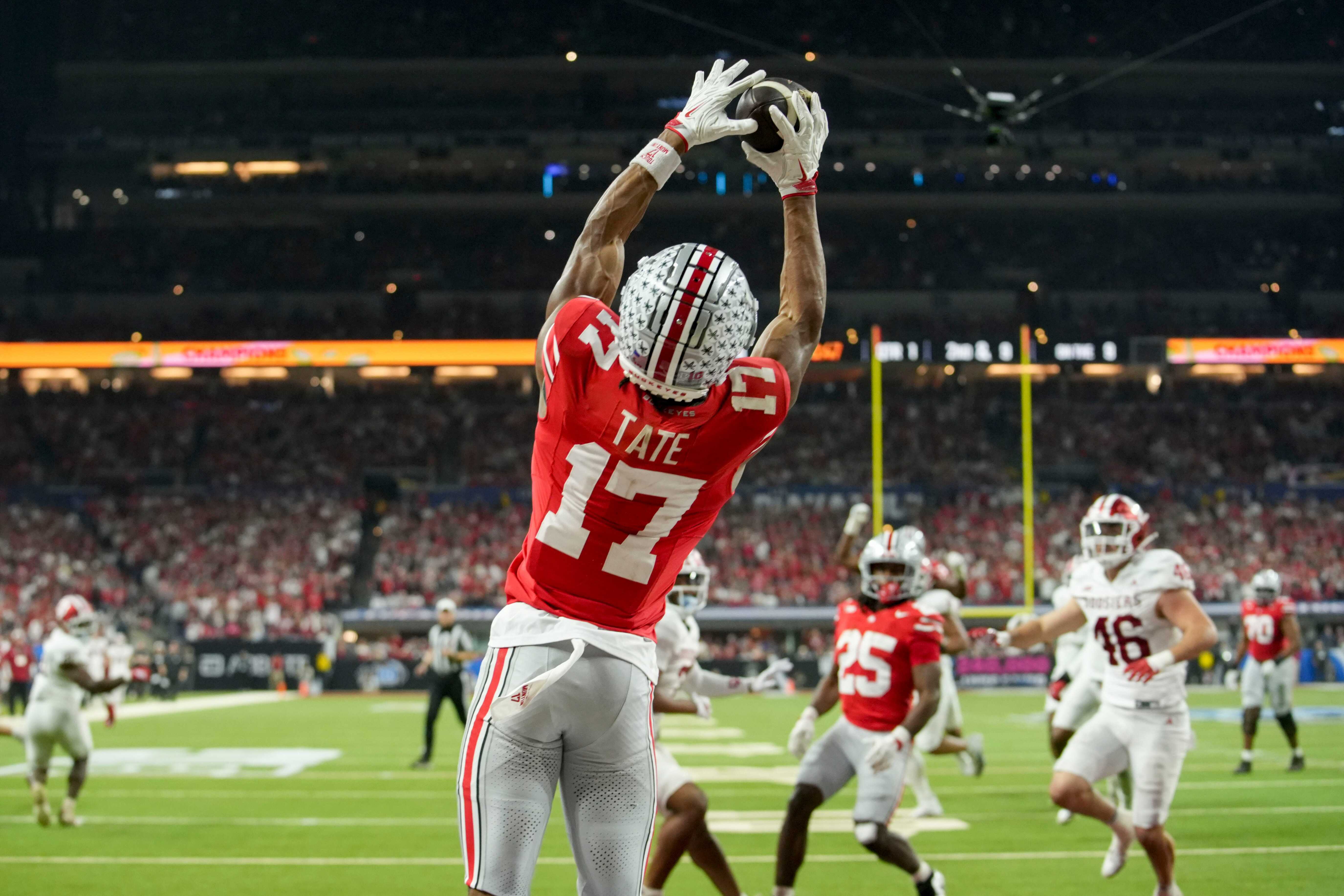 We're breaking down who will be the first wide receiver drafted in the 2026 NFL Draft, with Ohio State's Carnell Tate (17) being the favorite. 