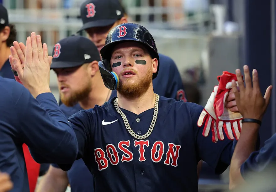 Alex Verdugo of the Boston Red Sox reacts after scoring a run, and we offer new U.S. bettors our exclusive BetMGM bonus code.