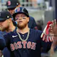 Alex Verdugo of the Boston Red Sox reacts after scoring a run, and we offer new U.S. bettors our exclusive BetMGM bonus code.