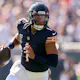 Justin Fields of the Chicago Bears scrambles with the ball against the Denver Broncos, and we offer new U.S. bettors our exclusive bet365 bonus code.
