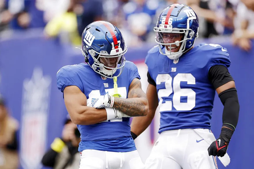 Wan'Dale Robinson of the New York Giants celebrates with Saquon Barkley after scoring a touchdown against the Baltimore Ravens.