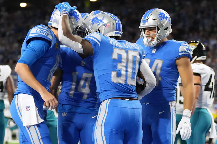 Jamaal Williams of the Detroit Lions celebrates with teammates after rushing for a touchdown against the Jacksonville Jaguars at Ford Field in Detroit, Michigan. Photo by Nic Antaya/Getty Images via AFP.