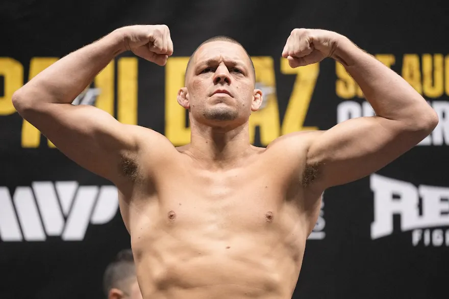 Nate Diaz gestures to the crowd during weigh-ins for his fight against Jake Paul, and we have an exclusive BetMGM bonus code for new bettors to use for the event.