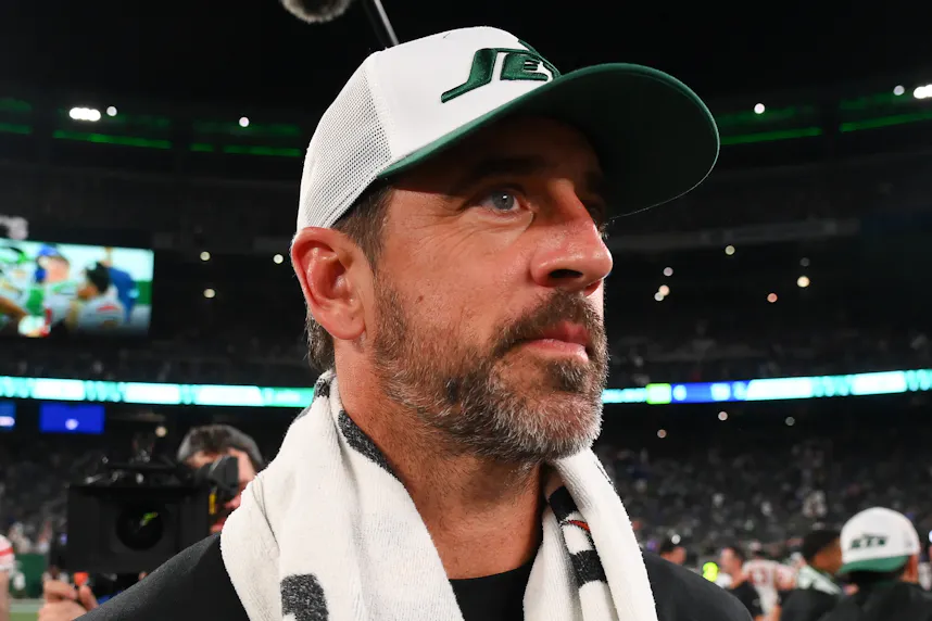 New York Jets quarterback Aaron Rodgers (8) looks on as we offer our Jets vs. 49ers prediction for Monday Night Football.