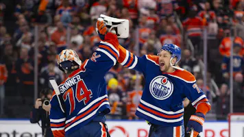 Goaltender Stuart Skinner #74 and Vincent Desharnais #73 of the Edmonton Oilers celebrate as we look at the best 2024 Stanley Cup odds.