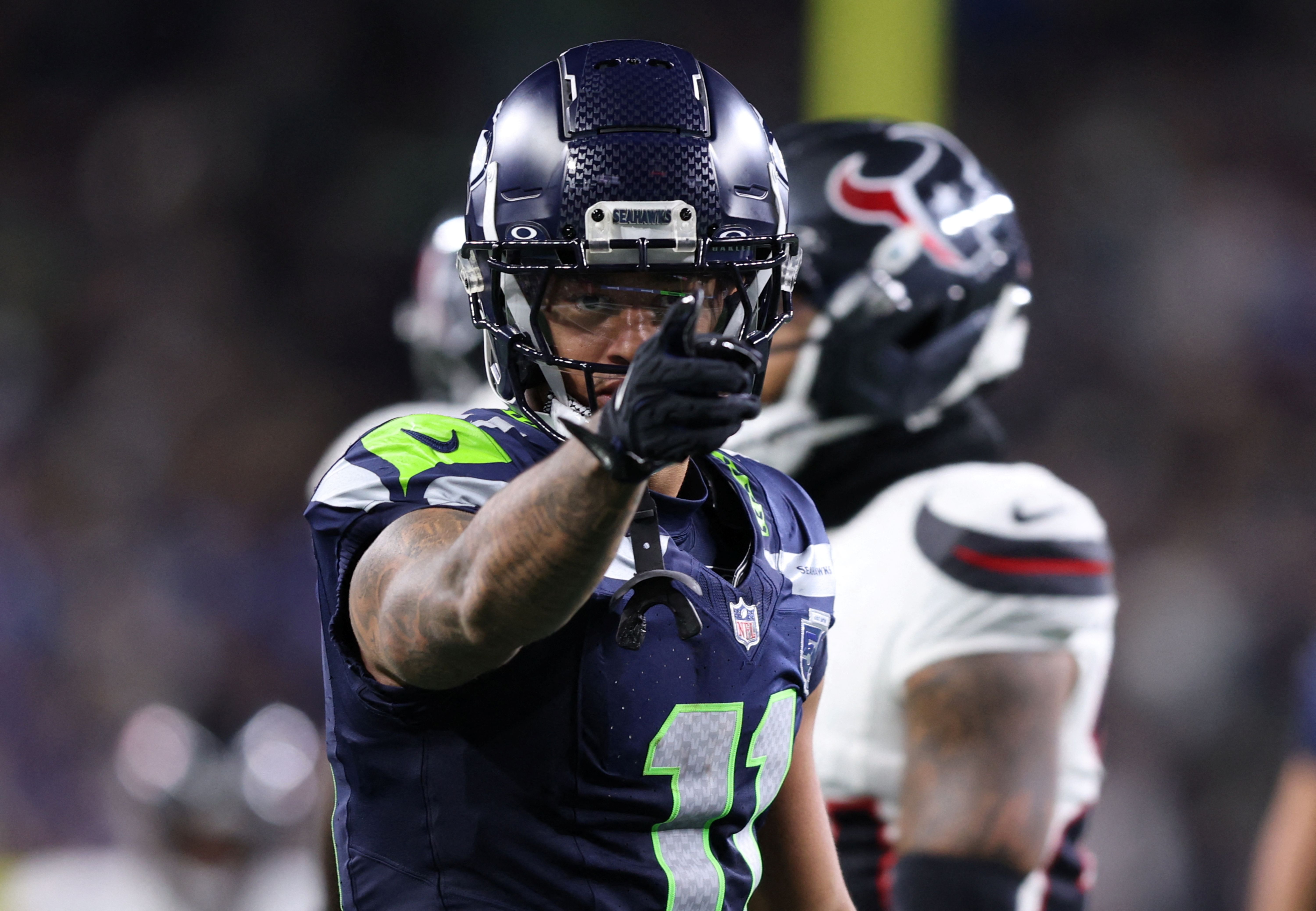 Seattle Seahawks wide receiver Jaxon Smith-Njigba celebrates after a first down as we look at our 49ers vs. Seahawks prediction.