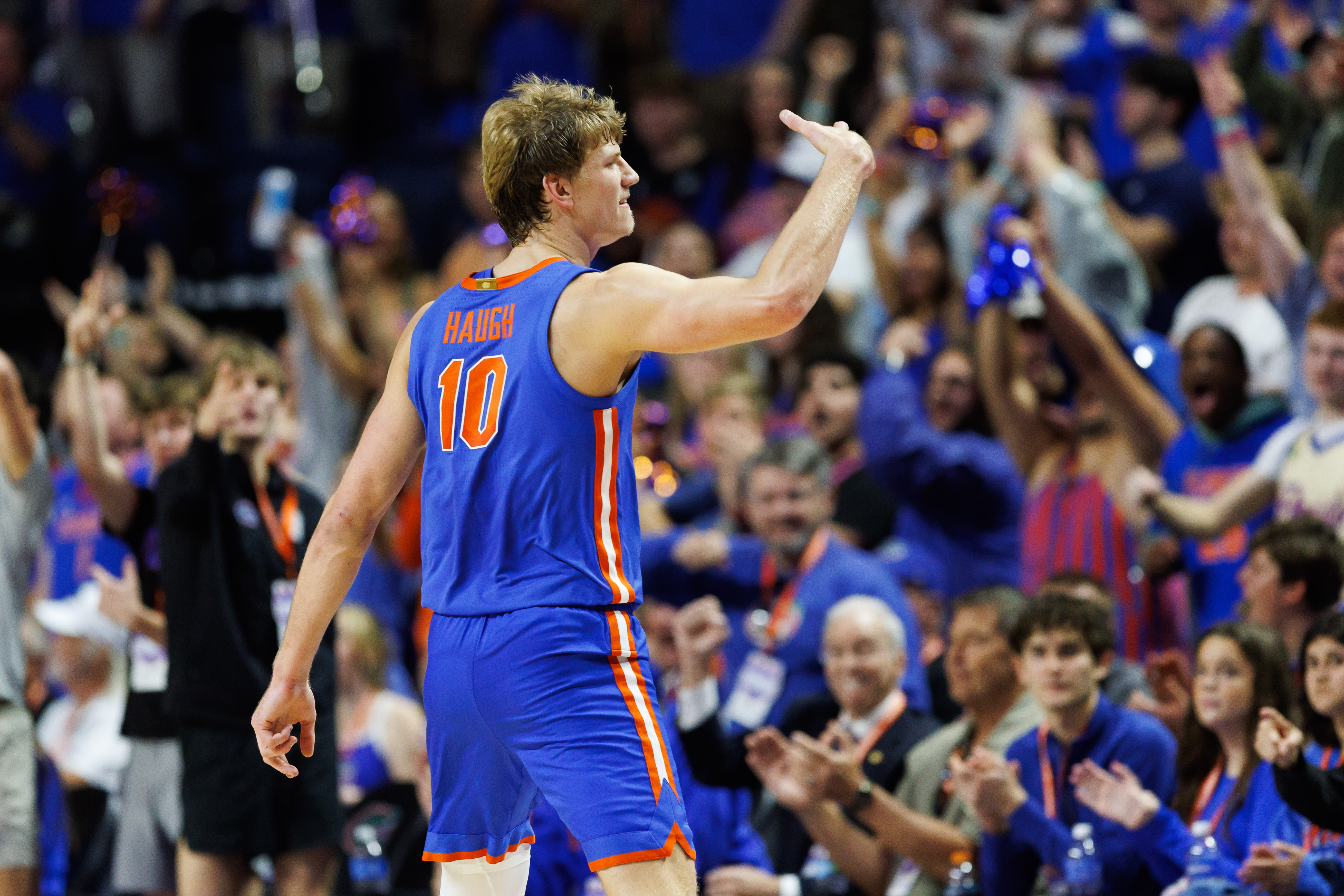 Florida Gators forward Thomas Haugh (10) gestures toward the crowd as we break down our College Basketball predictions & best bets today.