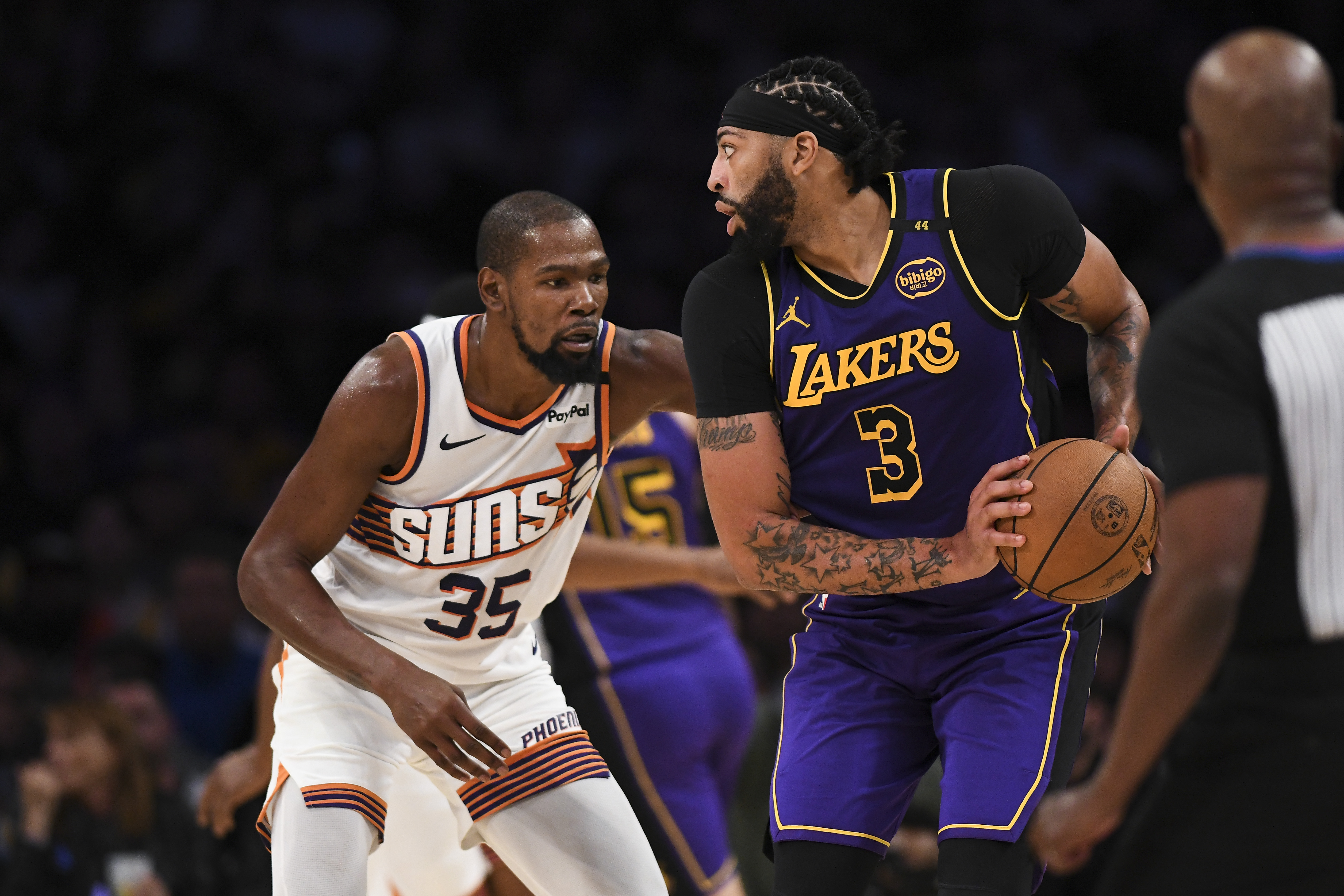Los Angeles Lakers forward Anthony Davis looks to pass as we offer our sports equinox best bets and parlay picks.