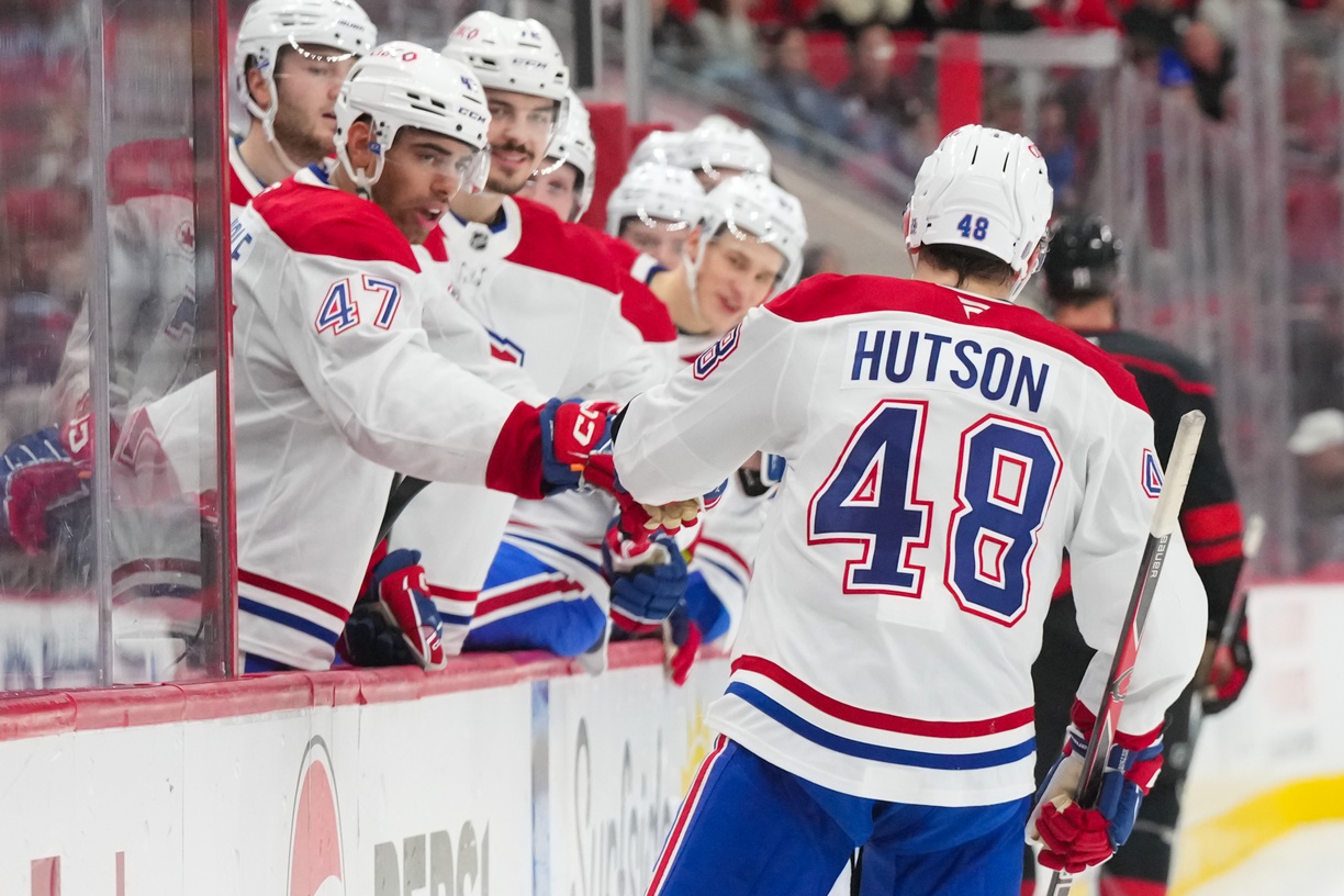 Lane Hutson celebrates a goal as we provide our NHL player props today. 