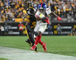 New York Giants wide receiver Malik Nabers (1) is tackled as we offer our FanDuel promo code for Giants vs. Cowboys.