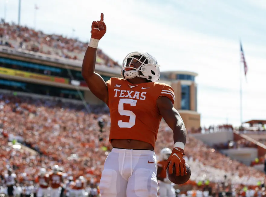 Bijan Robinson #5 of the Texas Longhorns features in our NFL draft bold predictions.
