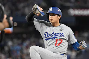 Los Angeles Dodgers designated hitter Shohei Ohtani - who's the focal point of my Shohei Ohtani player prop bets for Game 3 - celebrates after hitting a single.