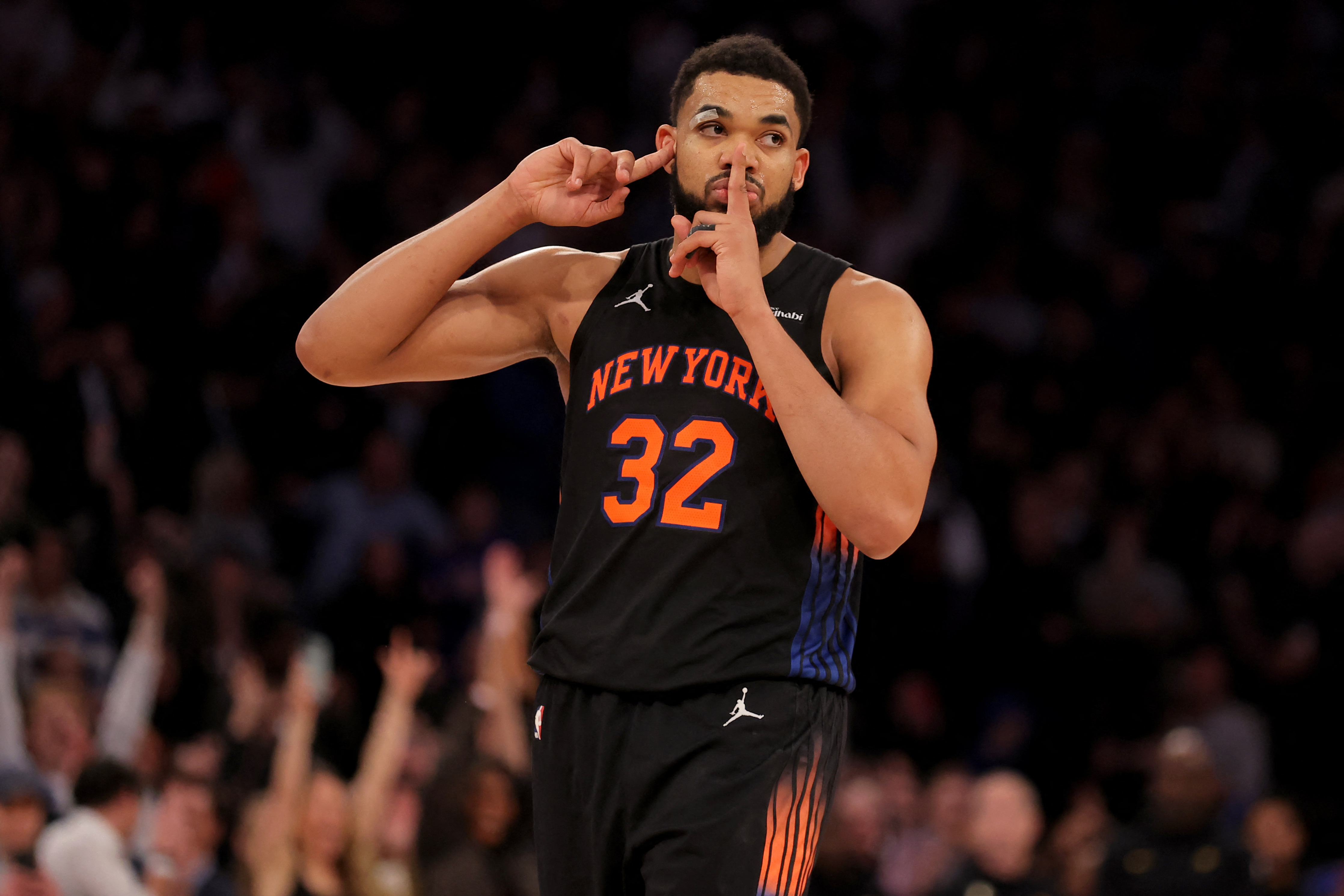 New York Knicks center Karl-Anthony Towns reacts after tying the game with two free throws against the Indiana Pacers, and he's featured in our Knicks vs. 76ers player props.
