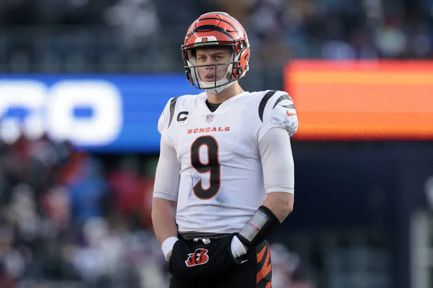 Joe Burrow of the Cincinnati Bengals looks on against the New England Patriots during the first half of the game at Gillette Stadium on December 24, 2022 in Foxborough, Massachusetts.