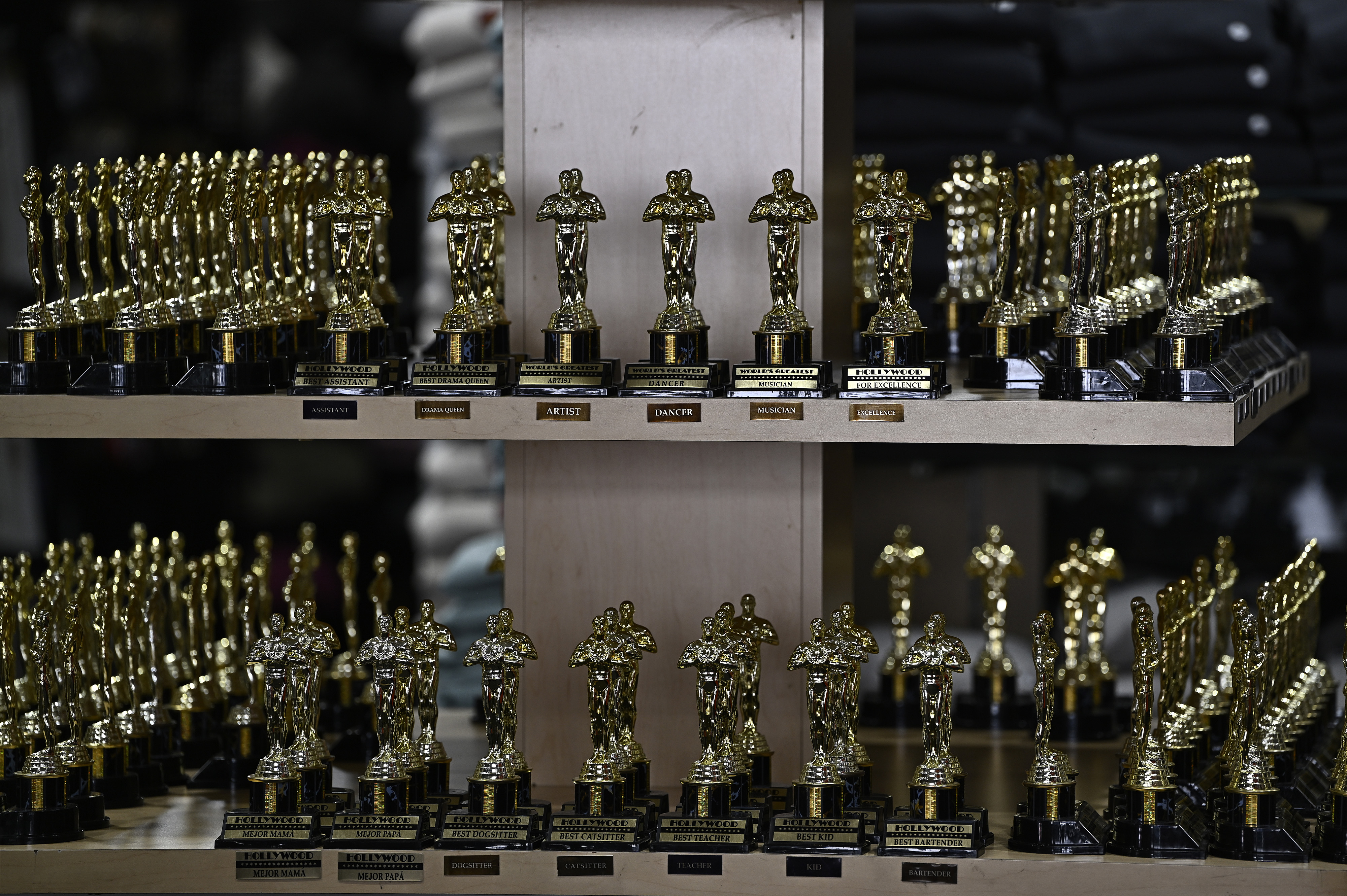 Miniature Oscar statuette replicas on display for sale inside a souvenir shop along Hollywood Boulevard as preparation for the 98th Academy Awards is underway and we look at today's Oscars Odds