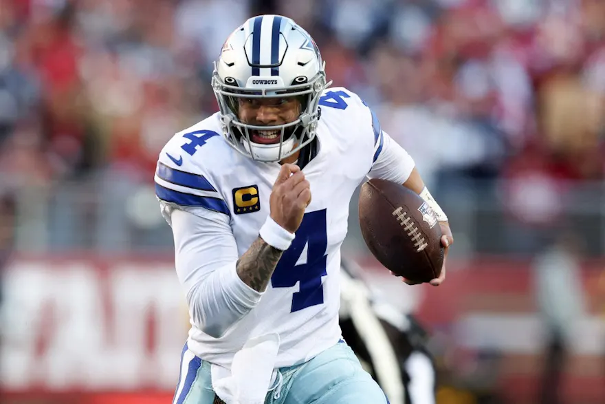 Dak Prescott of the Dallas Cowboys scrambles against the San Francisco 49ers during the first half in the NFC Divisional Playoff game at Levi's Stadium as we look at our Cowboys-Giants bet365 promo code.