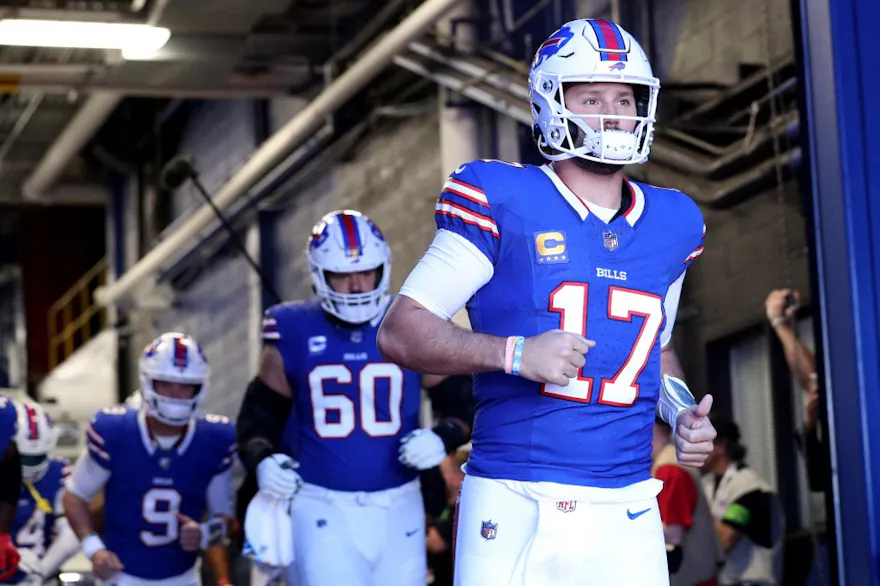 Josh Allen of the Buffalo Bills exits the tunnel before the game against the Miami Dolphins, and we offer our best Bills vs. Dolphins prediction for Sunday Night Football.
