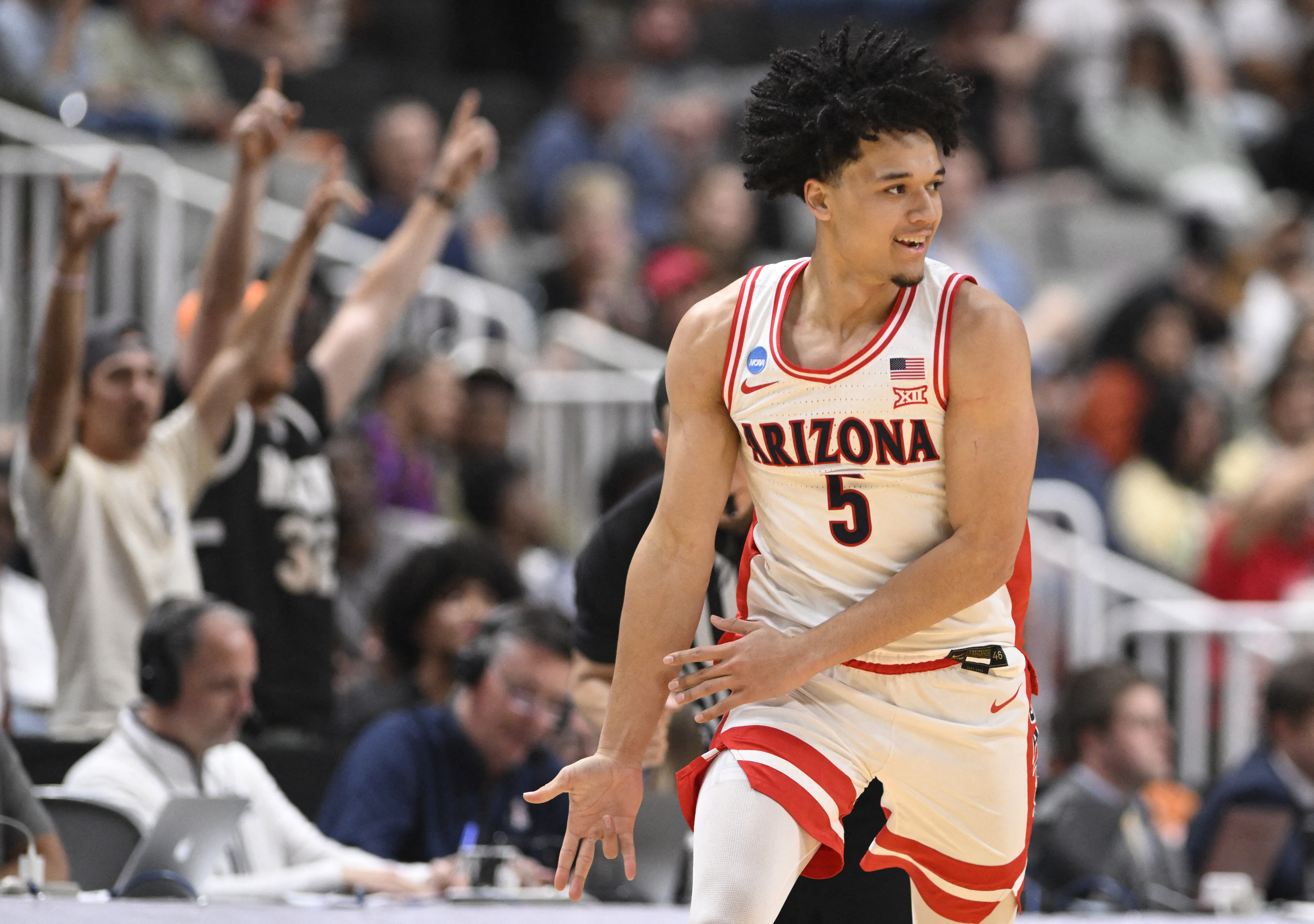 Arizona Wildcats guard Brayden Burries (5) celebrates as he is featured in our Michigan vs. Arizona same-game parlay.