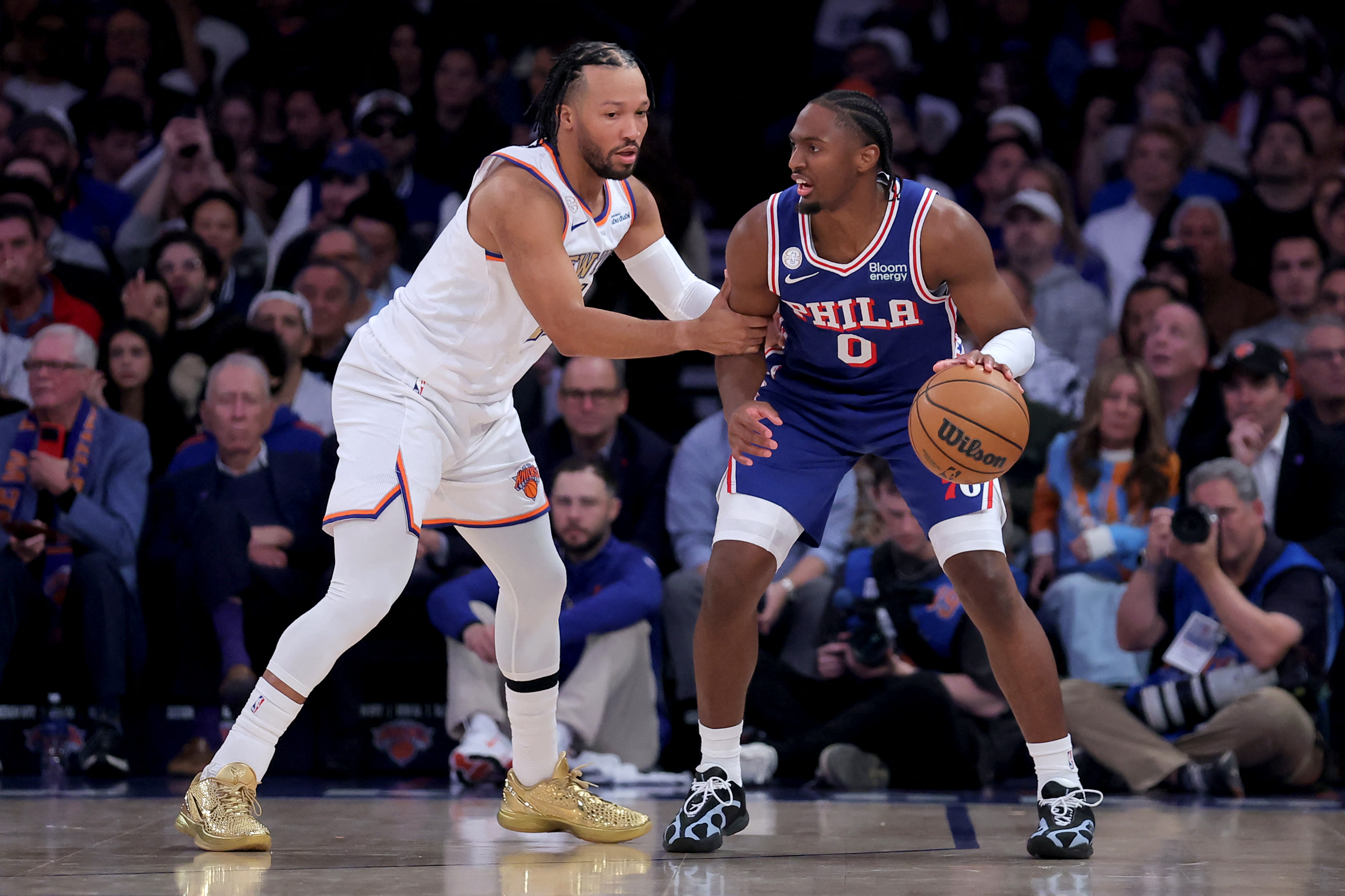 Philadelphia 76ers guard Tyrese Maxey (0) controls the ball against New York Knicks guard Jalen Brunson (11) as we offer our Knicks vs. 76ers prediction.
