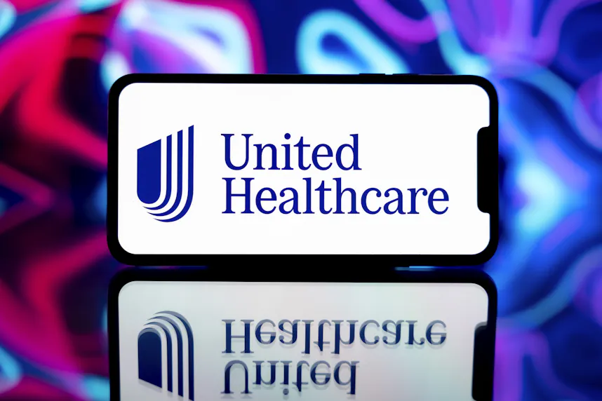 The UnitedHealthcare logo is displayed on a mobile phone screen in this photo illustration as we look at Polymarket offerings for the future of murder suspect Luigi Mangione.