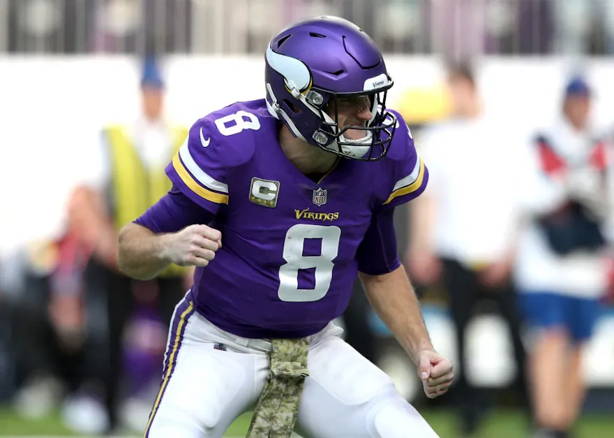 Kirk Cousins #8 of the Minnesota Vikings reacts after a touchdown in the first quarter at U.S. Bank Stadium.