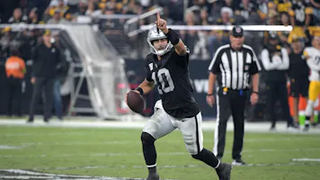 Jimmy Garoppolo #10 of the Las Vegas Raiders scrambles as we look at the NFL's interceptions leader odds for 2023.
