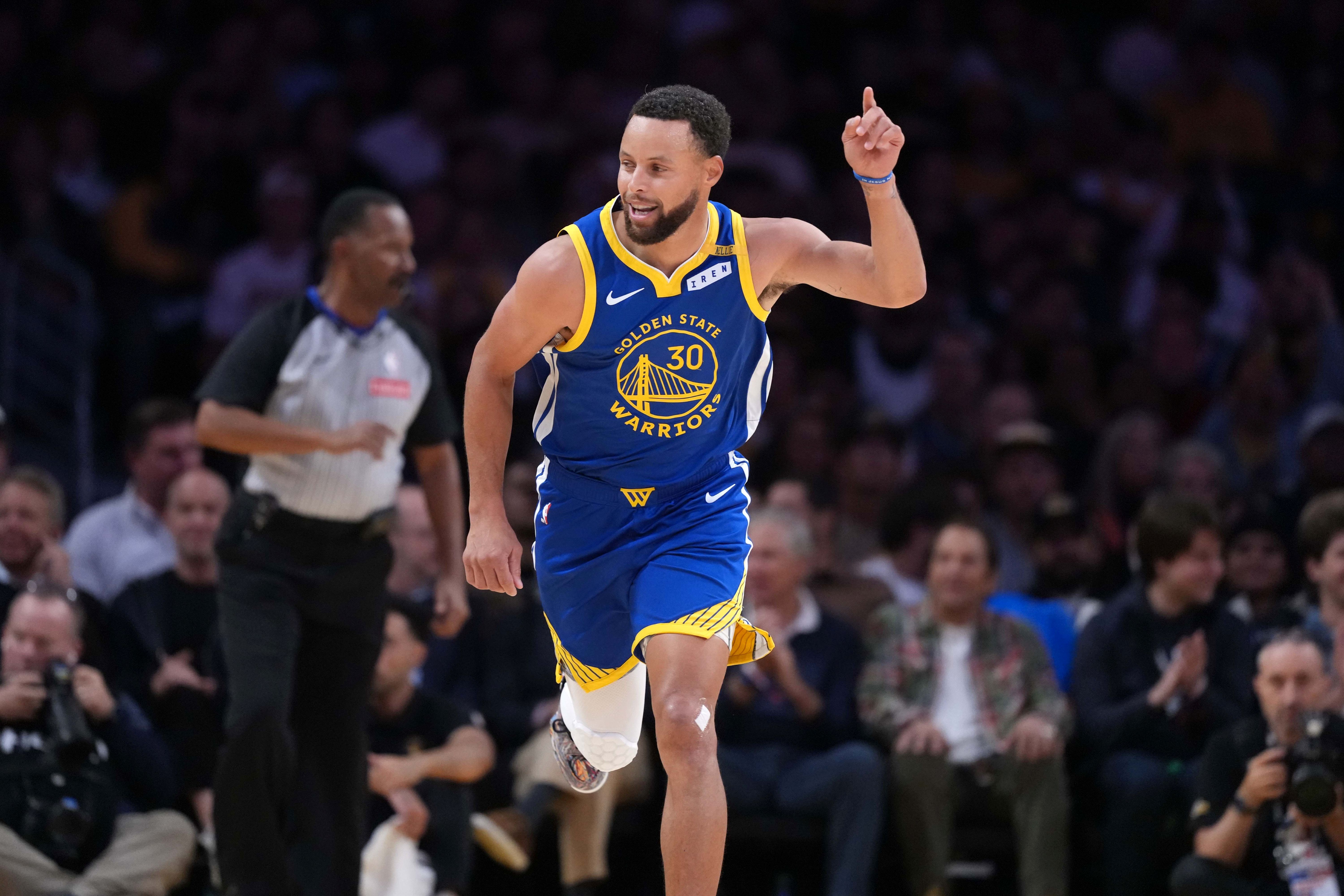 Golden State Warriors guard Stephen Curry (30) gestures as we break down our NBA best bets.