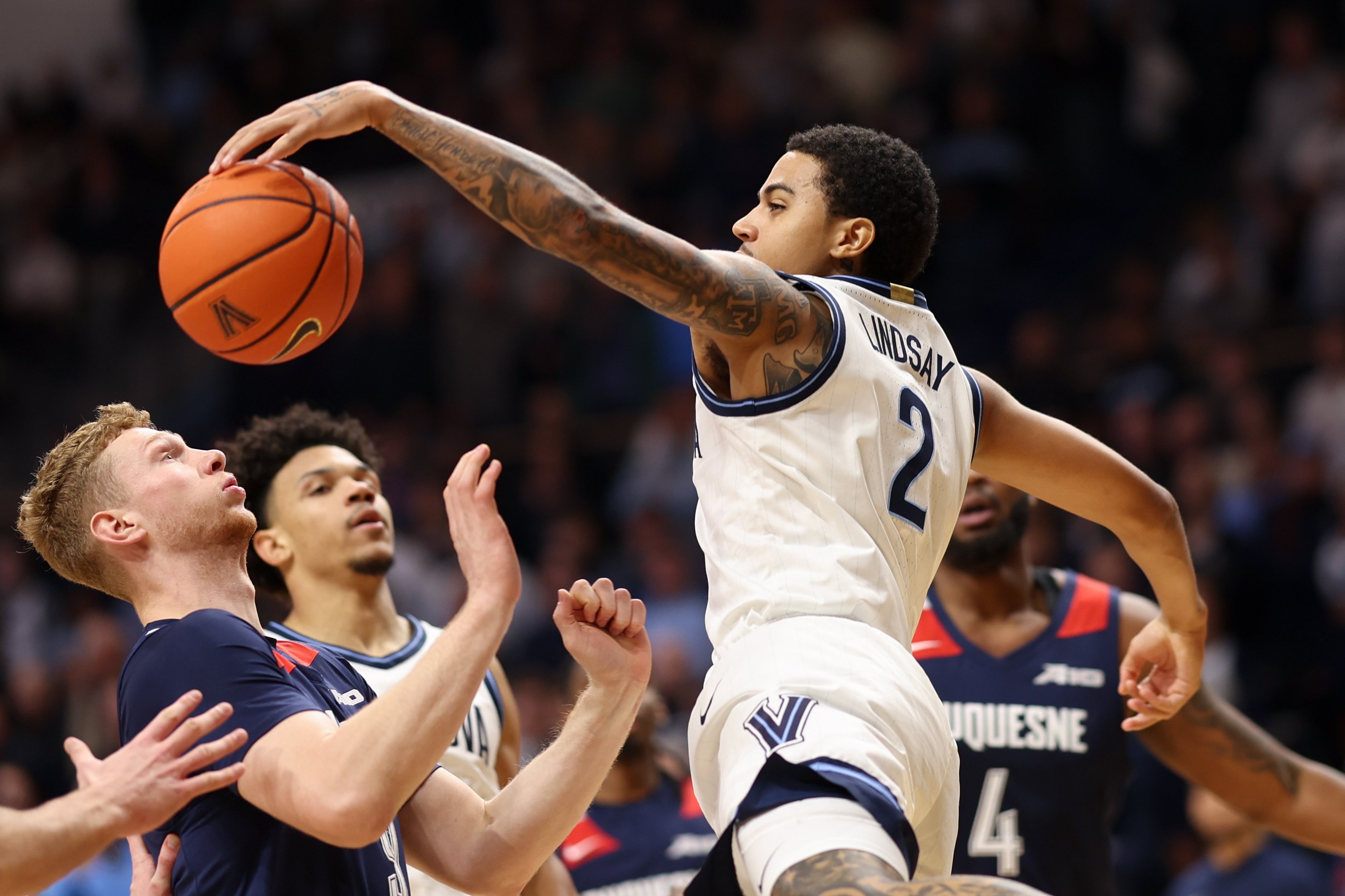 Villanova Wildcats guard Bryce Lindsay (2), seen here losing control of the ball, is featured in our college basketball best bets today.