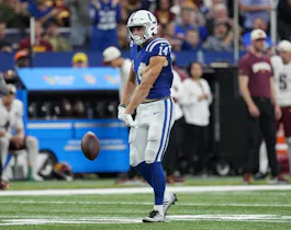 Alec Pierce of the Indianapolis Colts celebrates after making a reception in the fourth quarter of a game against the Washington Commanders at Lucas Oil Stadium on October 30, 2022 in Indianapolis, Indiana.