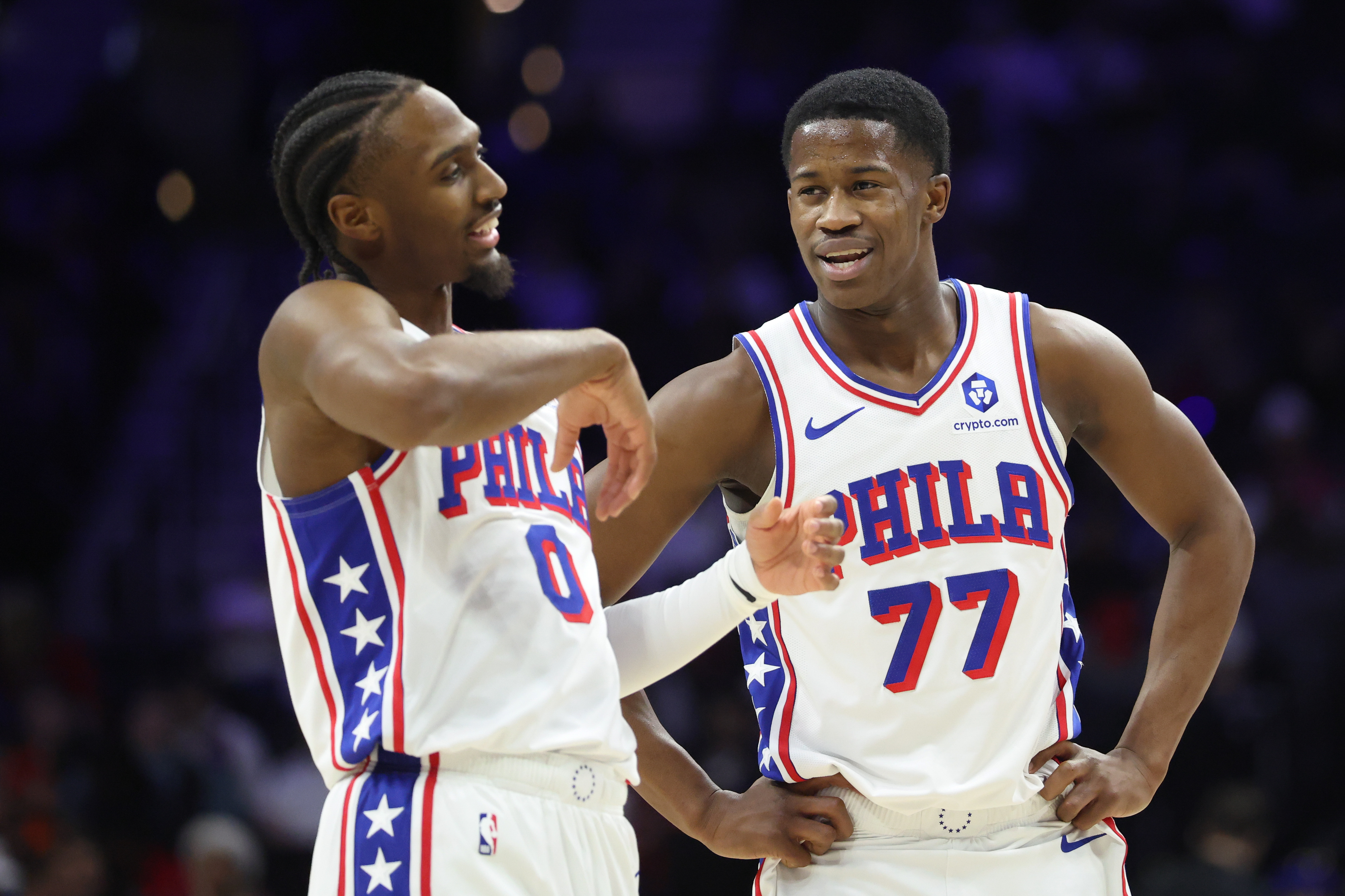 Philadelphia 76ers guards VJ Edgecombe (77) and Tyrese Maxey (0) talk, and both are featured in our Bucks vs. 76ers player props.