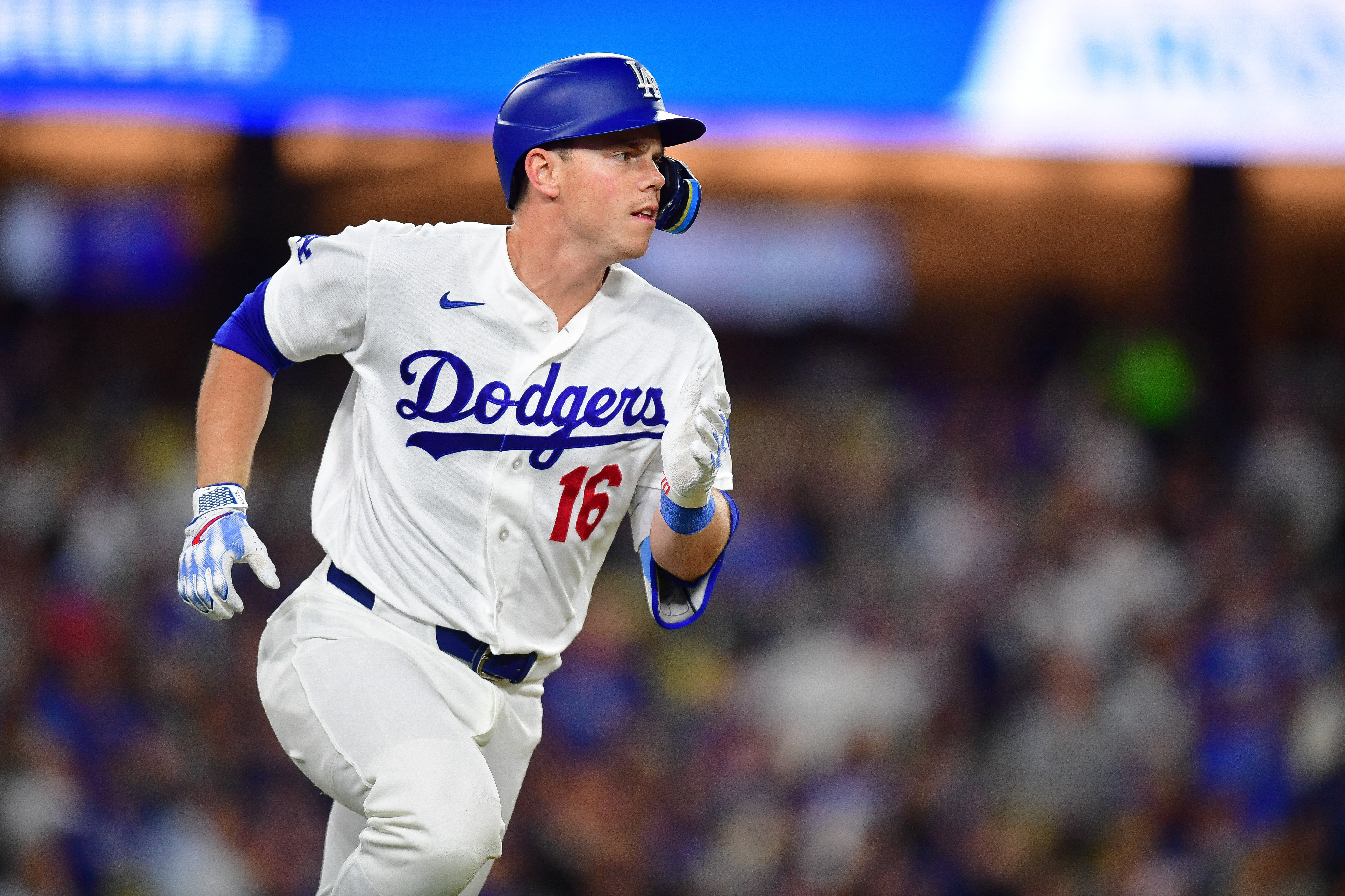 Dodgers catcher Will Smith (16) runs as we break down our Braves vs. Dodgers prediction.