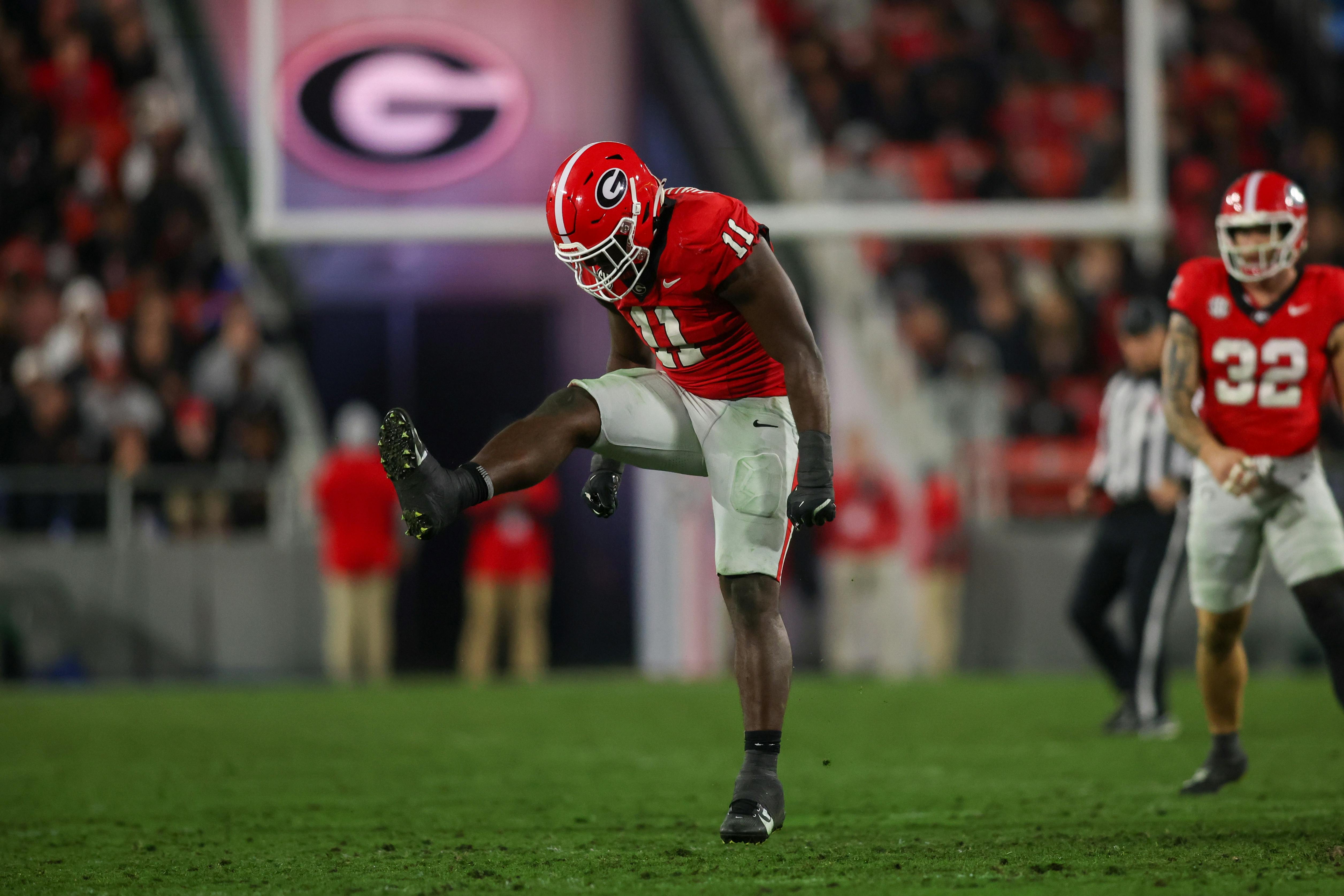 Georgia linebacker Jalon Walker reacts after a tackle against Tennessee. The Bulldogs lead the SEC Championship odds. 