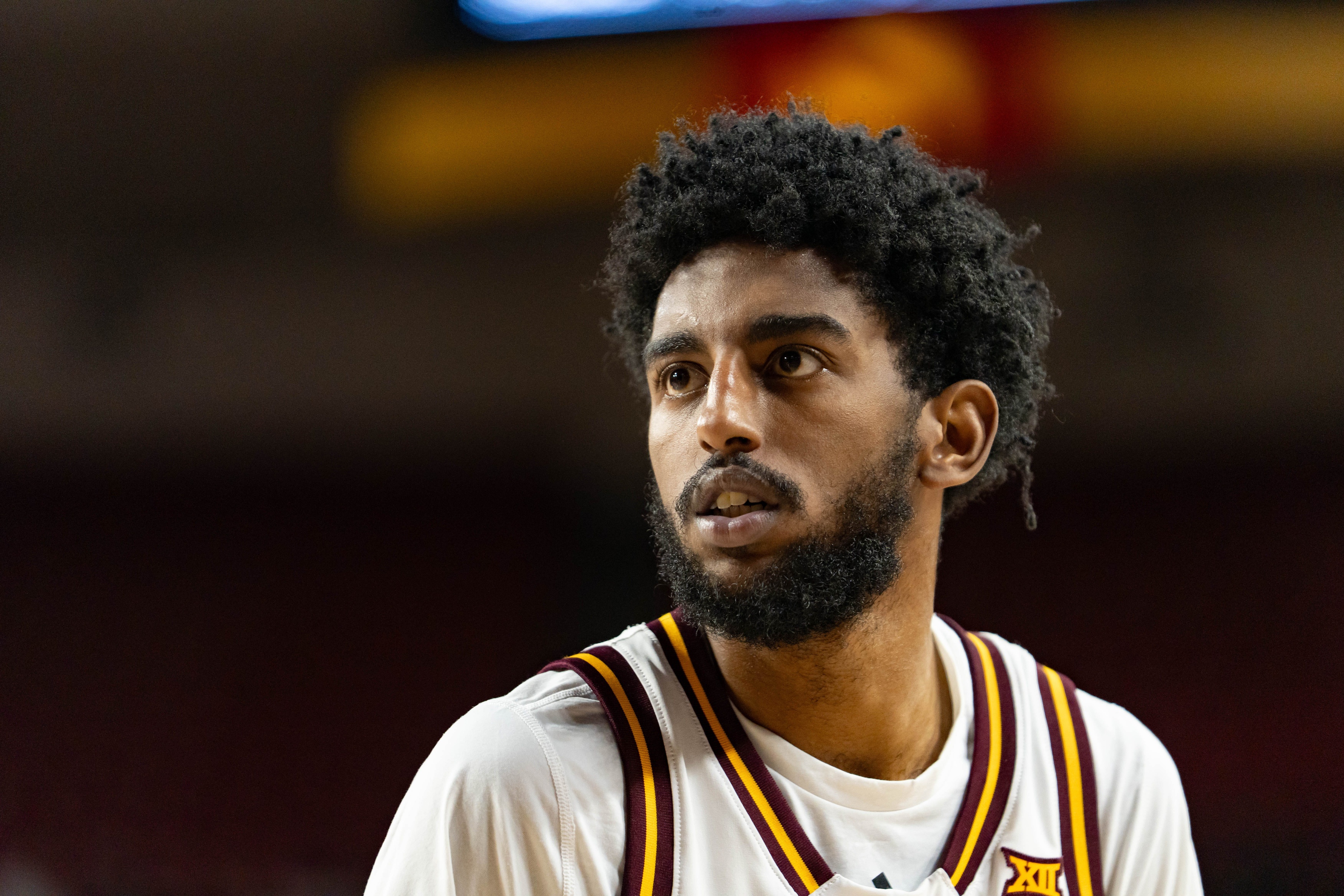 Arizona State Sun Devils guard Moe Odum (5), seen here looking at the net, is featured in our college basketball best bets today.