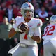 Quarterback CJ Stroud of the Ohio State Buckeyes drops back to pass against the Nebraska Cornhuskers in the first half at Memorial Stadium on November 6, 2021 in Lincoln, Nebraska.