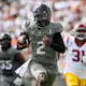 Shedeur Sanders of the Colorado Buffaloes rushes for a touchdown in the second quarter against the USC Trojans as we look at our BetRivers promo code.