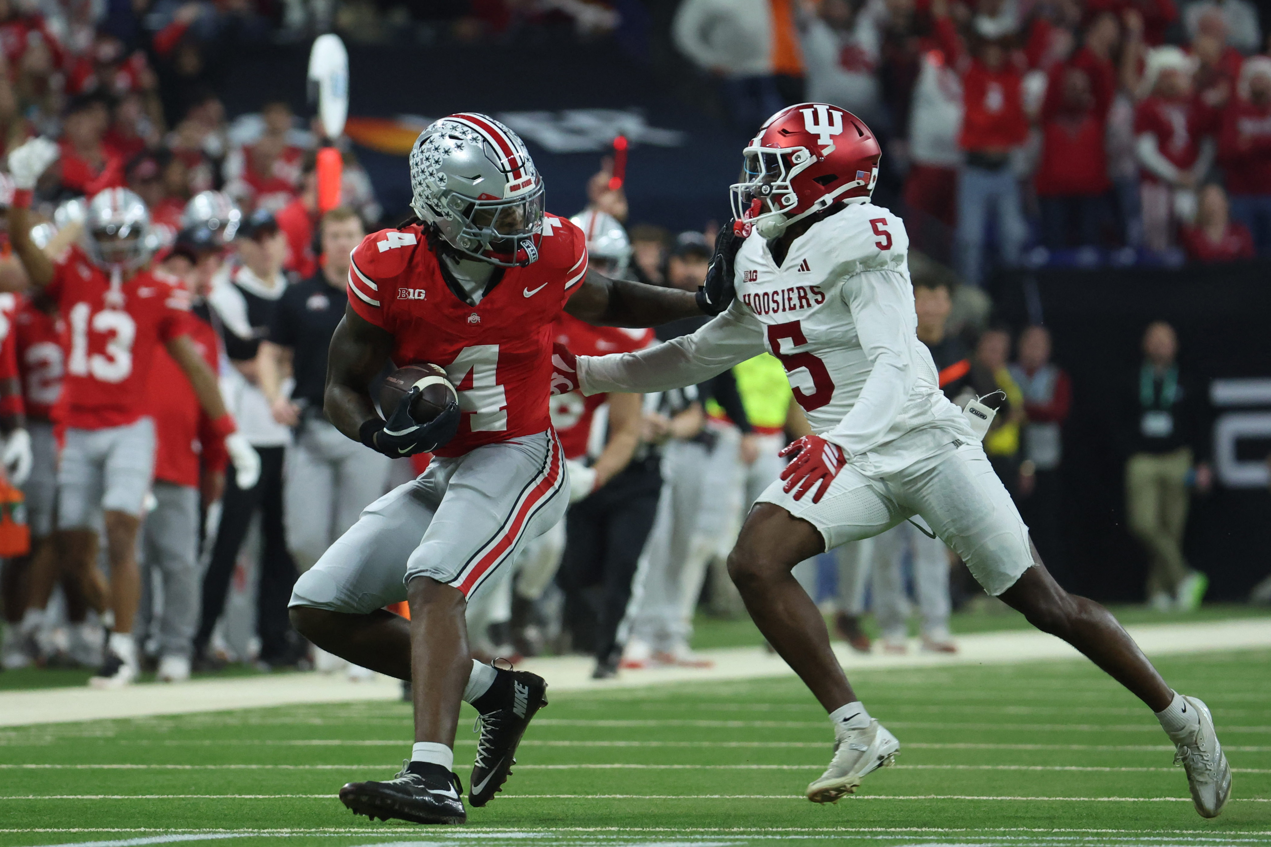 Ohio State Buckeyes wide receiver Jeremiah Smith (4) runs against Indiana Hoosiers defensive back D'Angelo Ponds (5) as we break down the 2026-27 CFP National Championship odds.