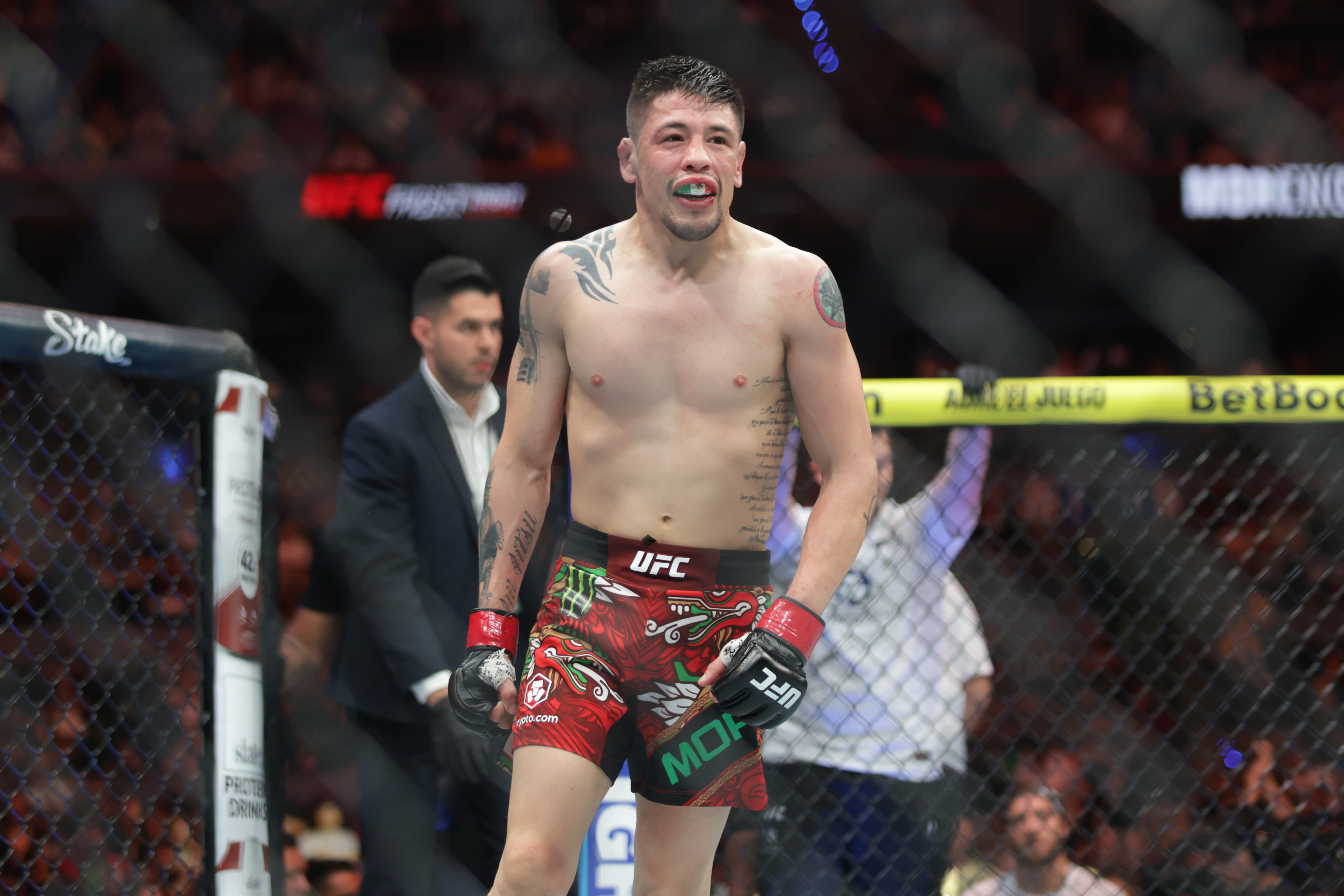 Brandon Moreno reacts after a victory as we offer our Brandon Moreno vs. Tatsuro Taira prediction