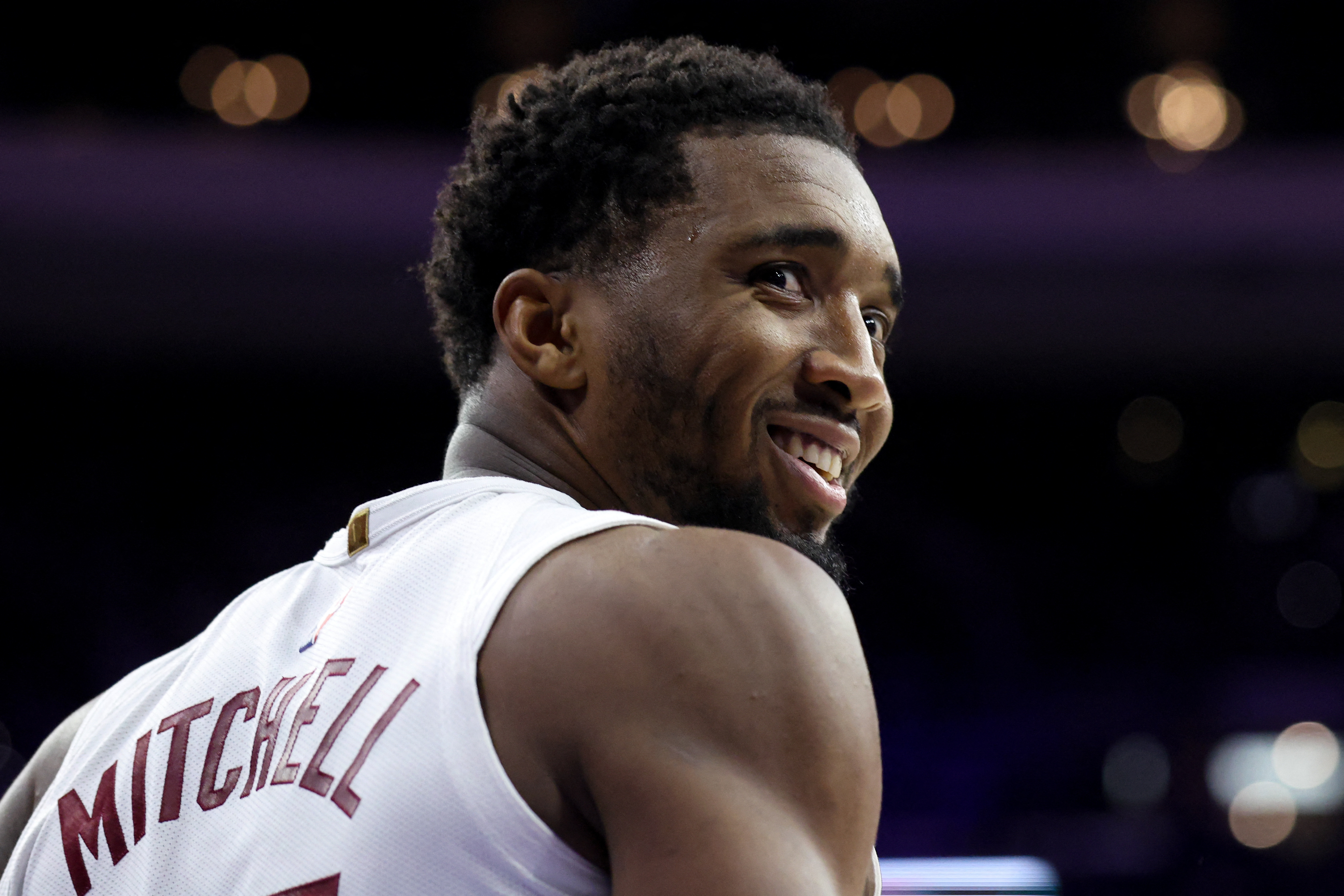 Cleveland Cavaliers guard Donovan Mitchell (45) smiles as we break down our NBA player props & best bets today.