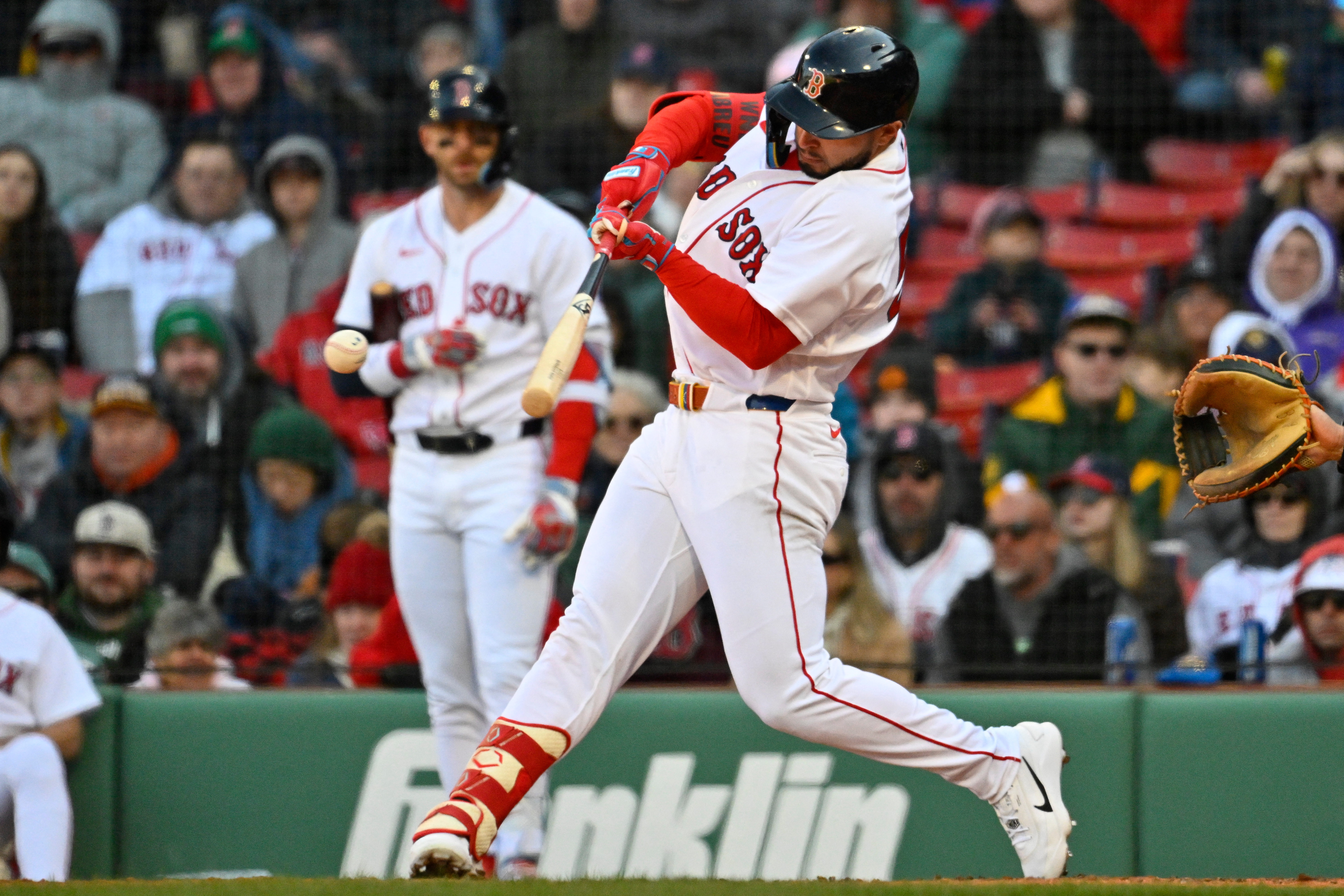 Boston Red Sox right fielder Wilyer Abreu (52) hits a single as he is featured in our Red Sox vs. Cardinals prediction.