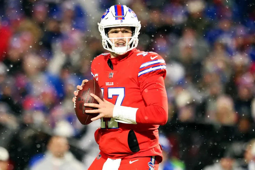 Josh Allen of the Buffalo Bills looks to pass against the Miami Dolphins, and we offer new U.S. bettors our exclusive BetMGM bonus code.