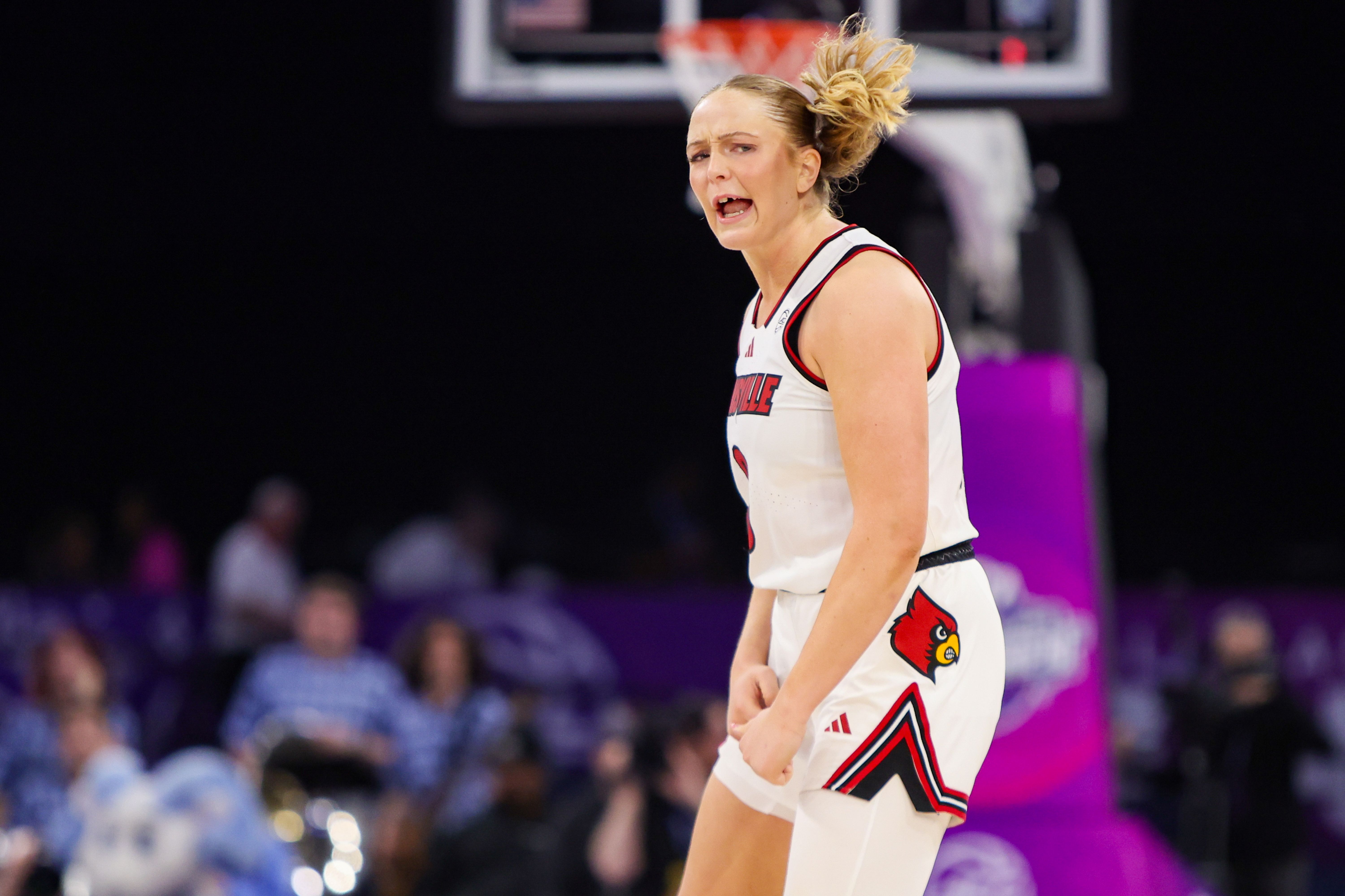 Louisville Cardinals forward Laura Ziegler reacts after a basket, and she's key as we look at our Louisville vs. Duke predictions.