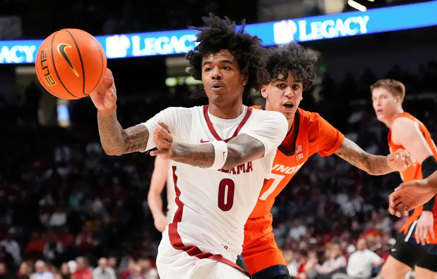 Alabama guard Labaron Philon makes a pass against Illinois. We're backing Philon in our college basketball best bets.