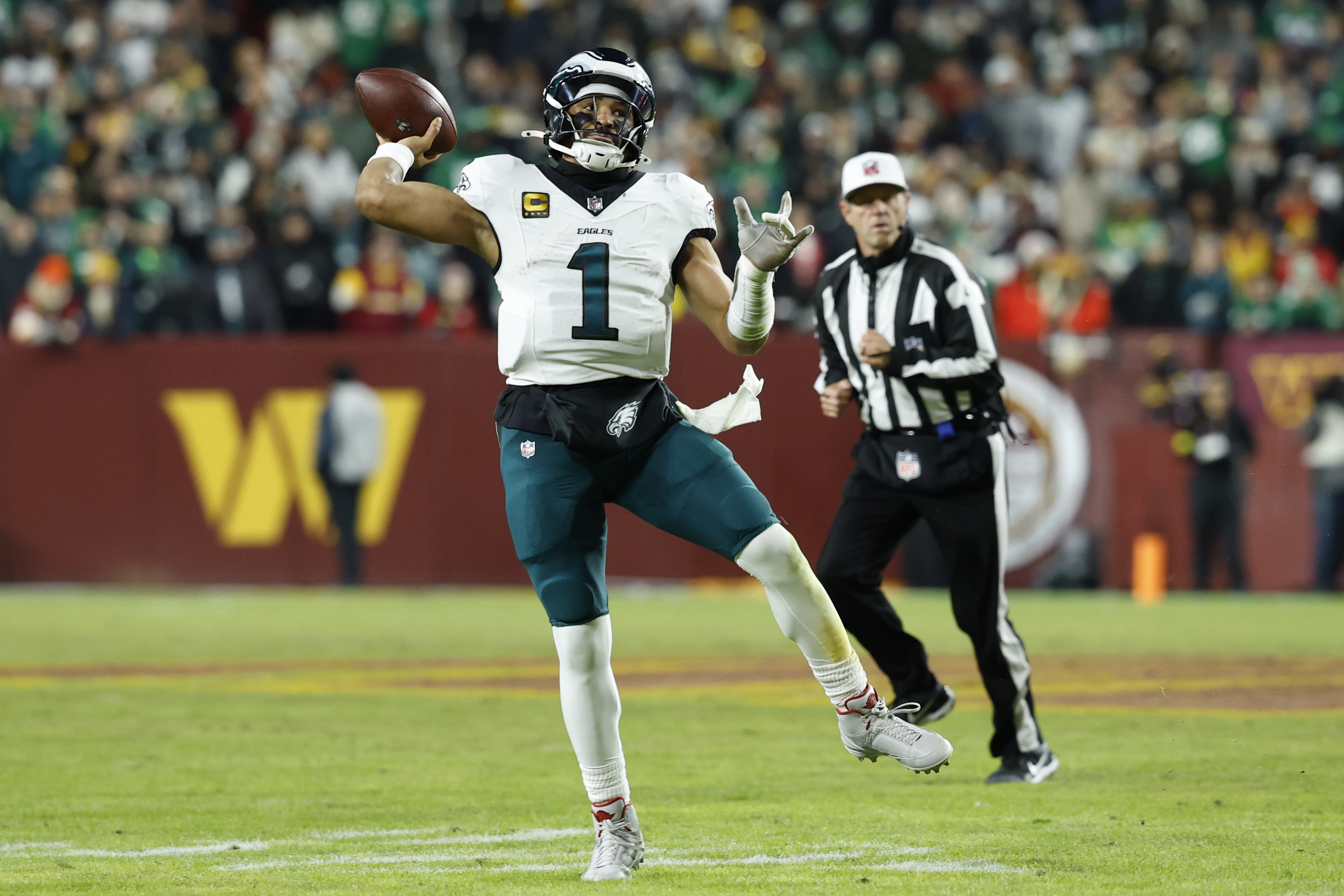 Philadelphia Eagles quarterback Jalen Hurts (1) passes as he is featured on our NFL picks against the spread.