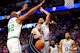 Dallas Mavericks guard Luka Doncic passes the ball against Boston Celtics center Al Horford and guard Derrick White during the fourth quarter of Game 3 of the 2024 NBA Finals. We look at both Doncic and Horford in our Celtics vs. Mavericks Parlay.