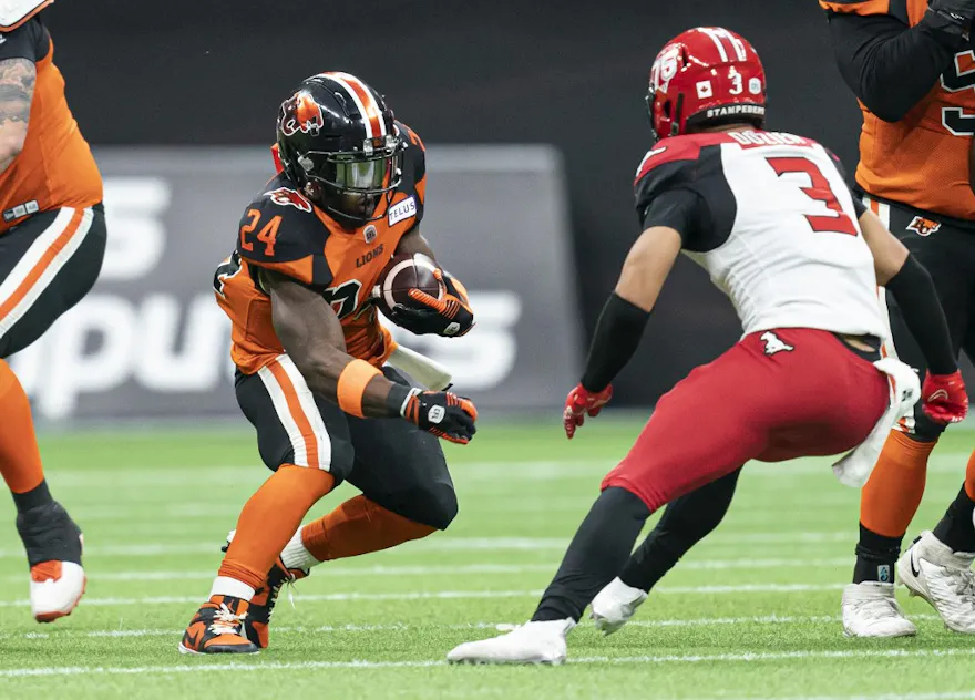 James Butler of the B.C. Lions is up against a Calgary Stampeders defender during recent CFL football action.