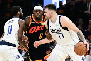 Luka Doncic of the Dallas Mavericks moves against Luguentz Dort of the Oklahoma City Thunder during Game 5 of the NBA playoffs. We're backing Doncic in our Thunder vs. Mavericks Player Props.