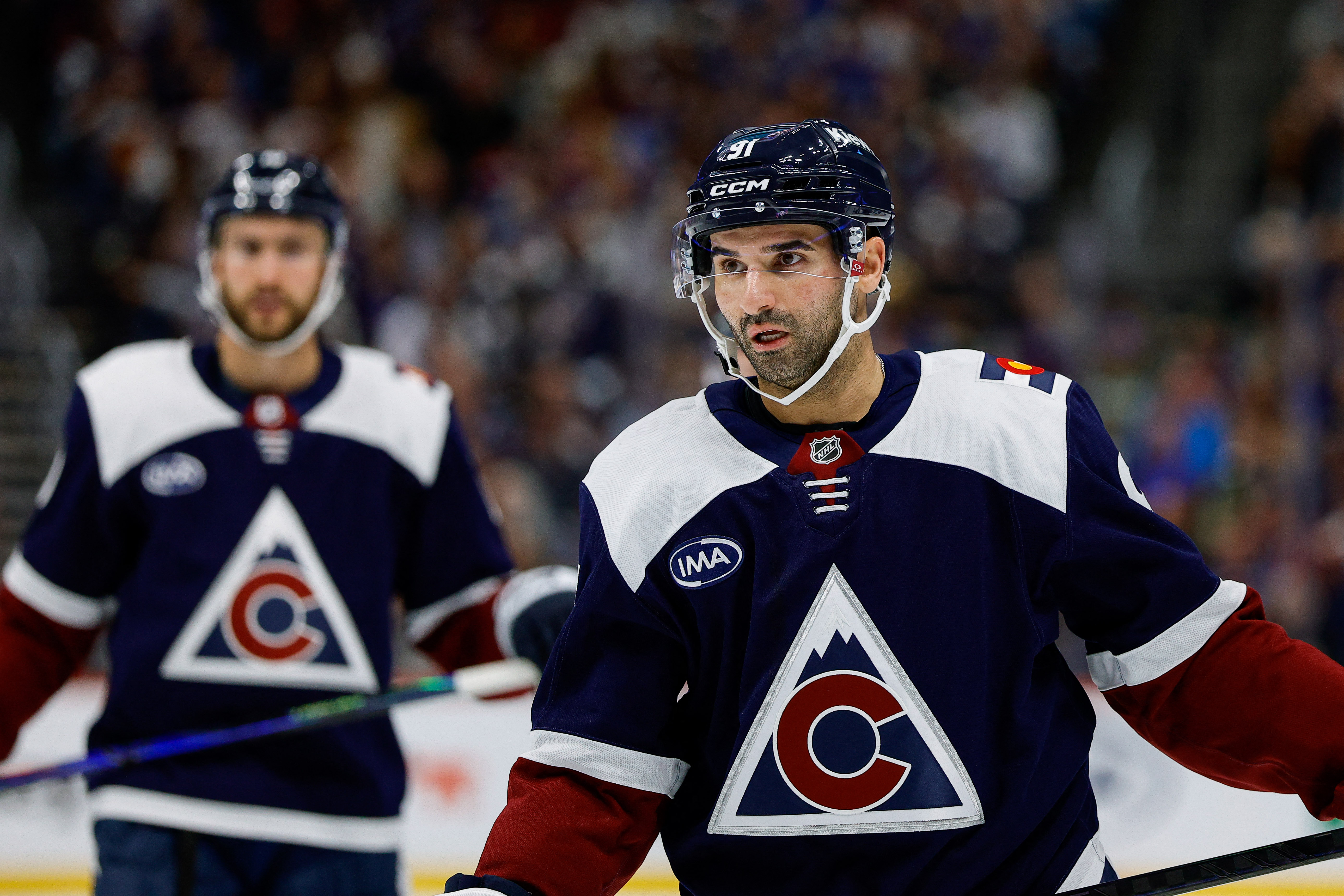 Colorado Avalanche center Nazem Kadri (91), seen here looking on during a game, is featured in our NHL player props tonight.