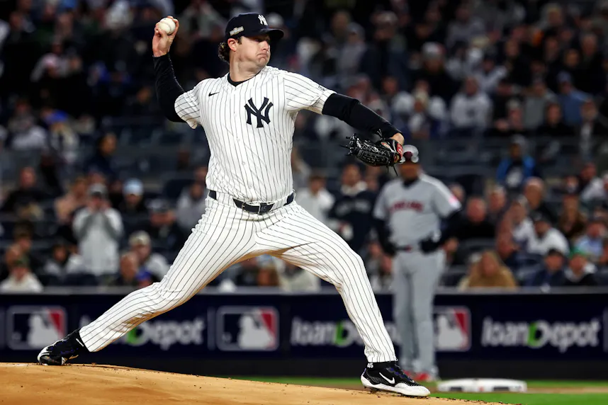 New York Yankees pitcher Gerrit Cole (45) throws a pitch as we offer our Yankees vs. Dodgers prediction for Game 1 of the World Series tonight.